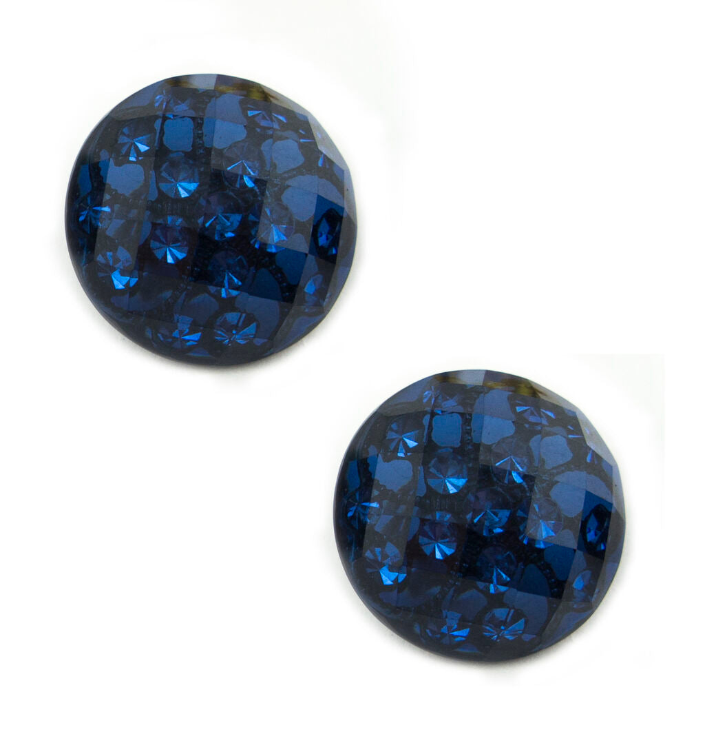 Two midnight blue crystal buttons on a white background.