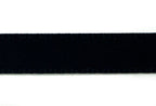 Black double faced satin ribbon on a crafting table