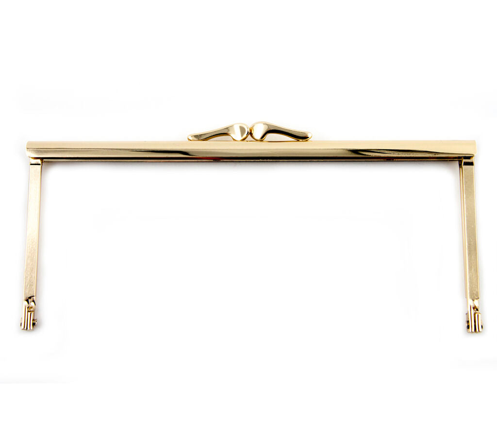 Elegant gold tone metal handbag frame with a square design.