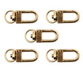 Five gold tone metal snap hook clasps displayed together.