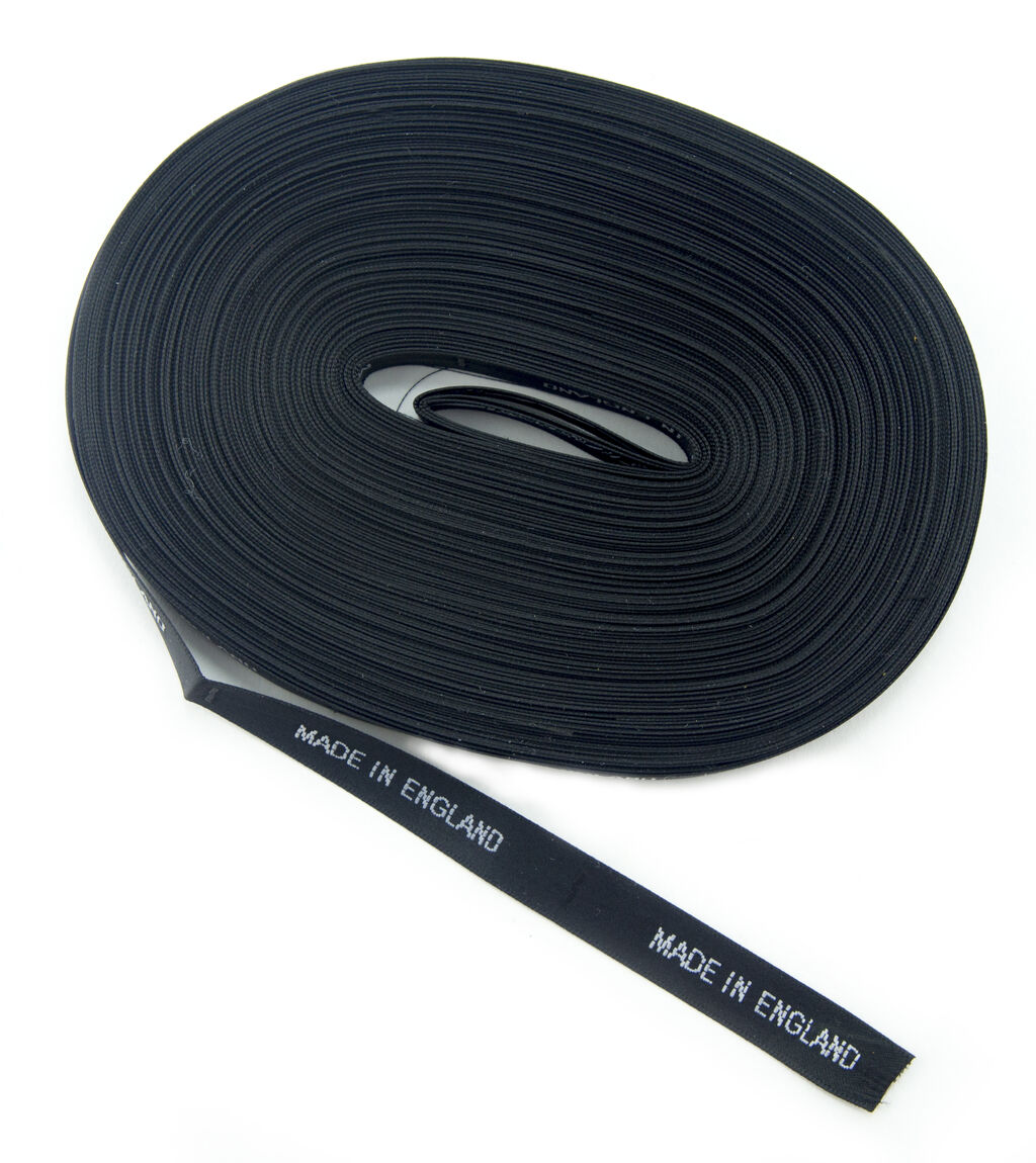 Roll of sew-in satin labels with 'Made in England' text.