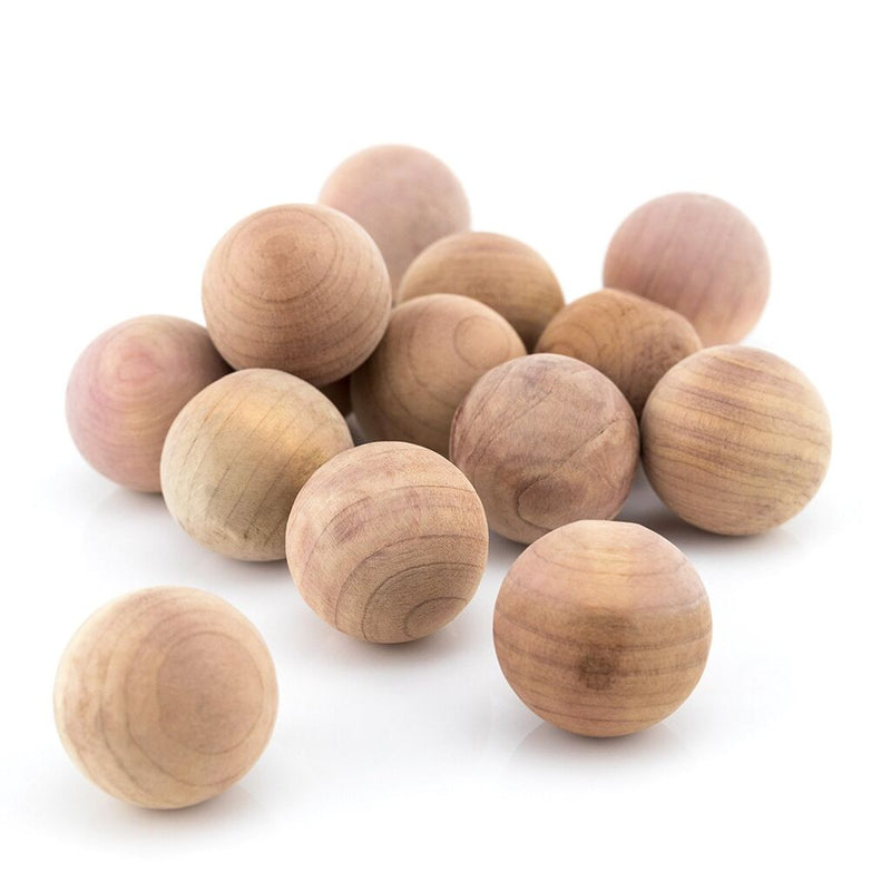 Pack of 20 natural banyan wood moth repellent balls in clear wrap.