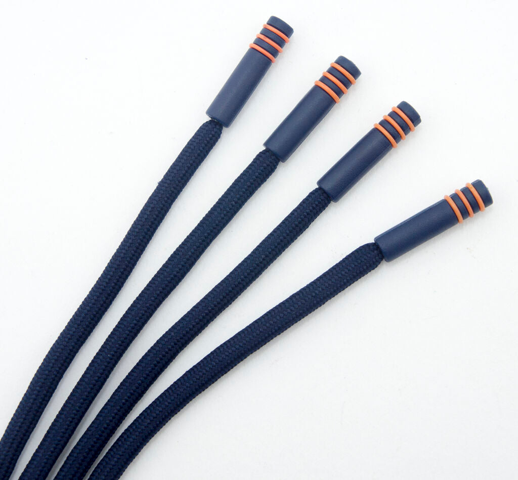 Black hoodie cords in use as drawstrings on a pair of trousers.