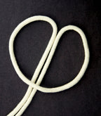 10 metres of densely woven cream cotton rope cord.