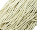 Strong cream cotton rope cord with inner core, 6mm diameter.