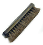 Natural horse hair brush with a brown wood handle