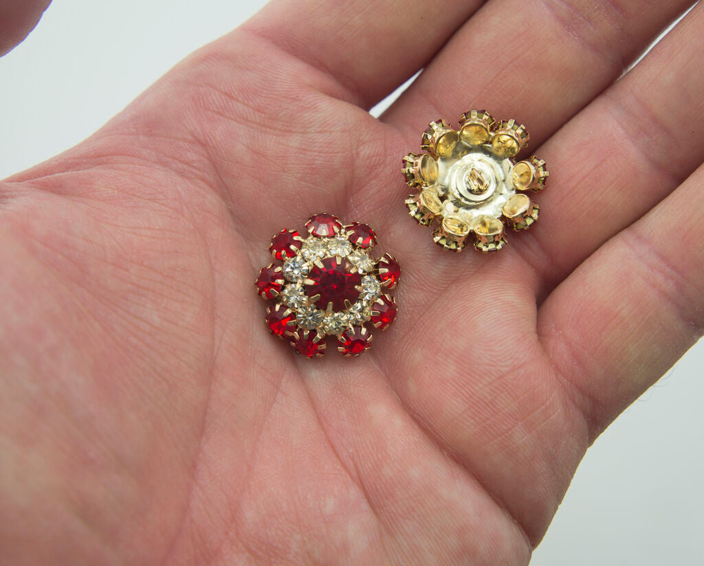 Close-up of a red crystal button showing detail