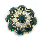 Display of the large emerald green buttons showing their shine.