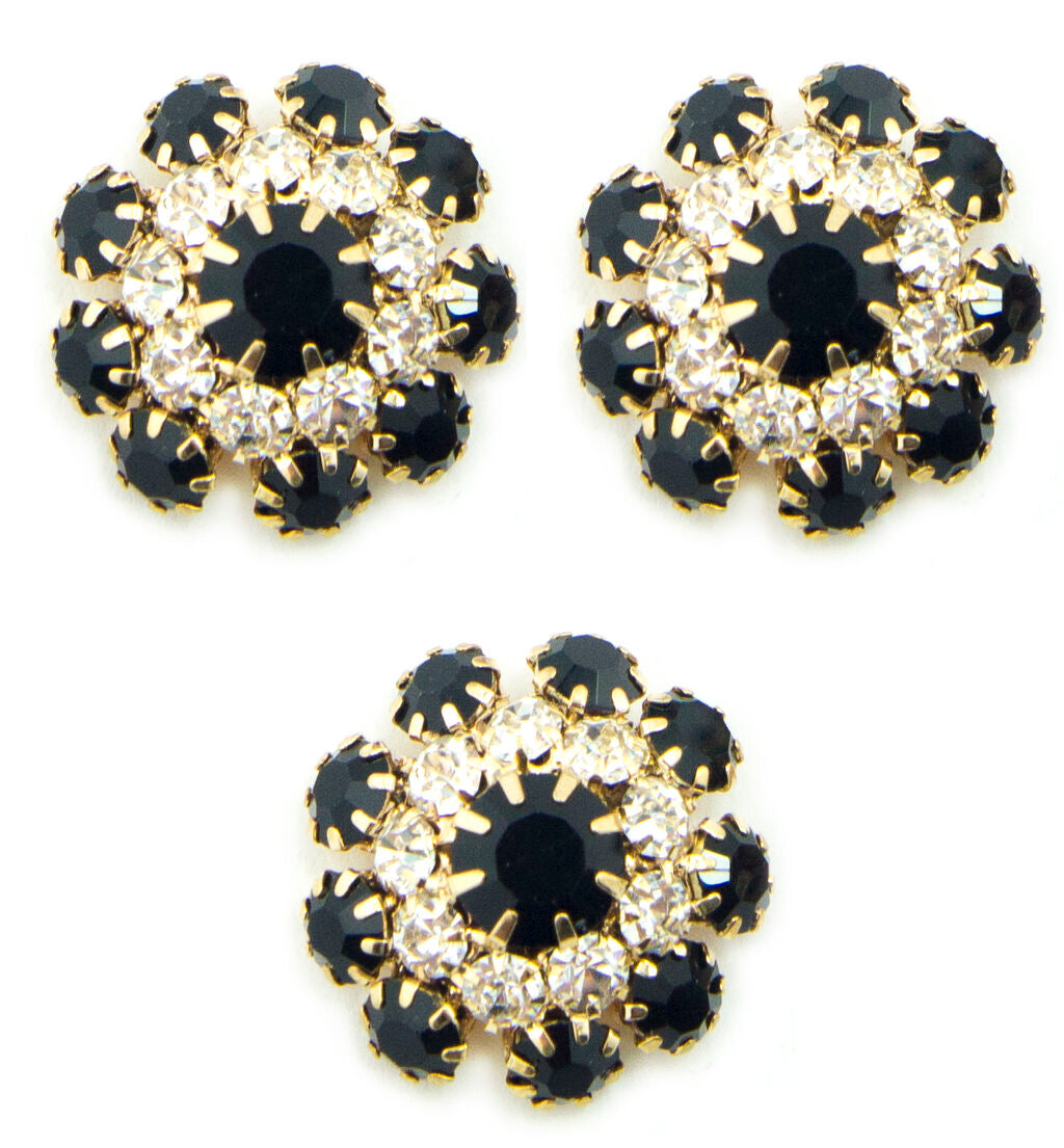 Set of 3 black and clear crystal buttons in a metal setting.