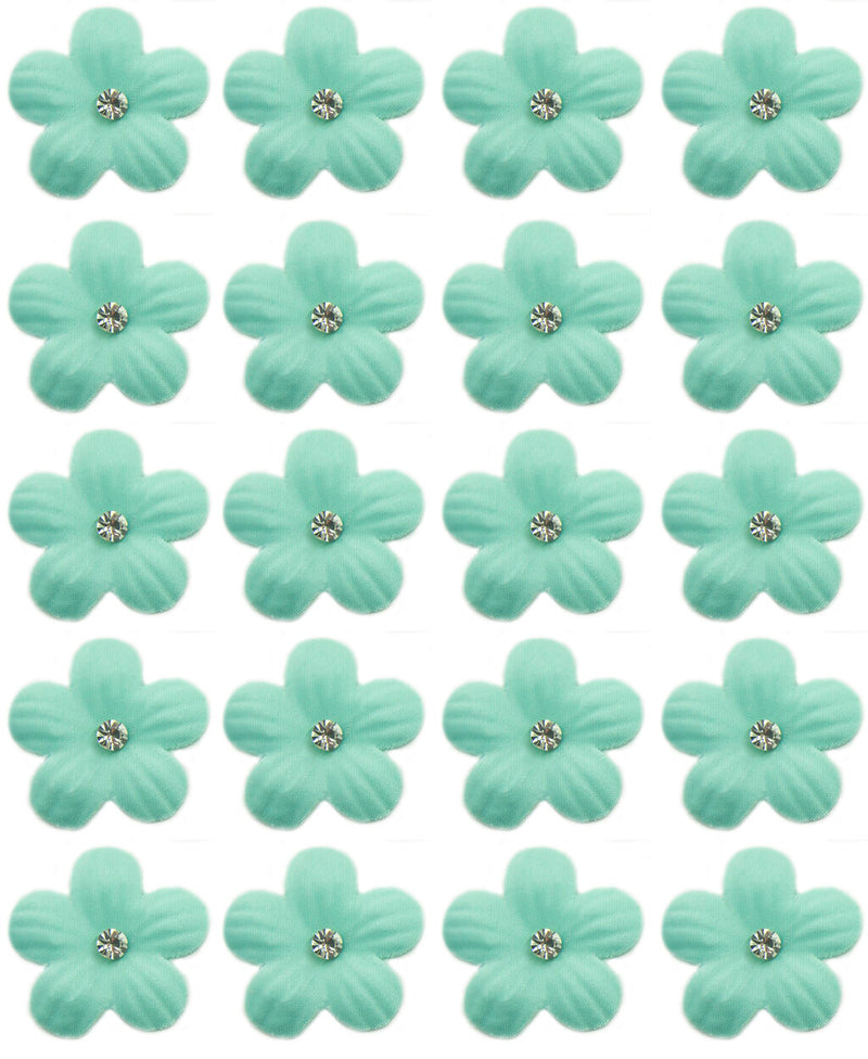 Pastel blue flower trim with crystal beads on a white background.
