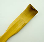 Close-up of the painted finish on the bamboo back scratcher