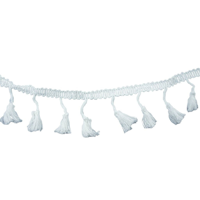 White cotton tassel trim displayed on a flat surface.