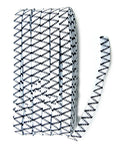 Roll of white and black sewing elastic on a table