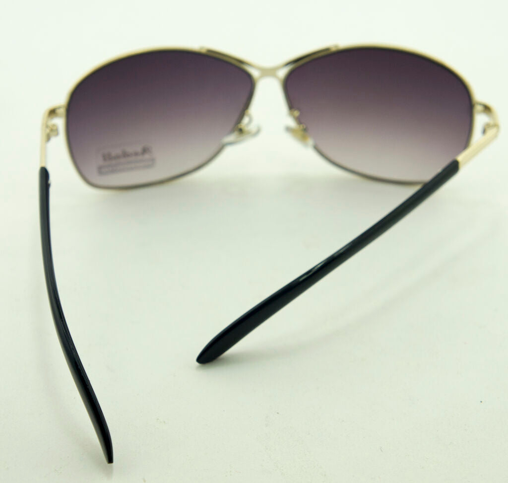 Lens detail of sunglasses, 65 mm wide and 50 mm deep.