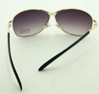 Lens detail of sunglasses, 65 mm wide and 50 mm deep.
