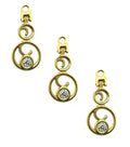 Gold tone and white crystal zip pull pendant on a fabric background.