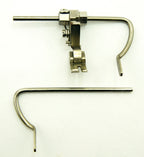 Close-up of the industrial sewing machine guide foot