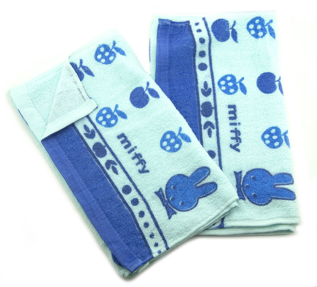 Blue Miffy kids towel with strawberry apple print