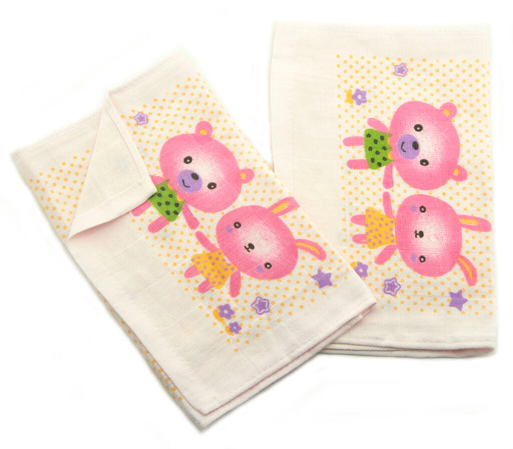 Stack of large cotton face cloths in blue, cream, and pink