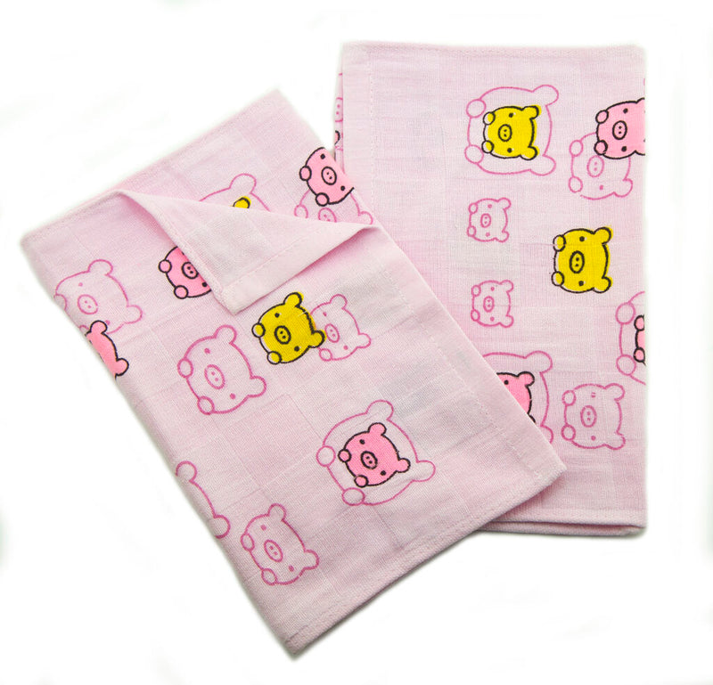 Set of 2 pink cotton face cloths for kids with Happy Baby motif.