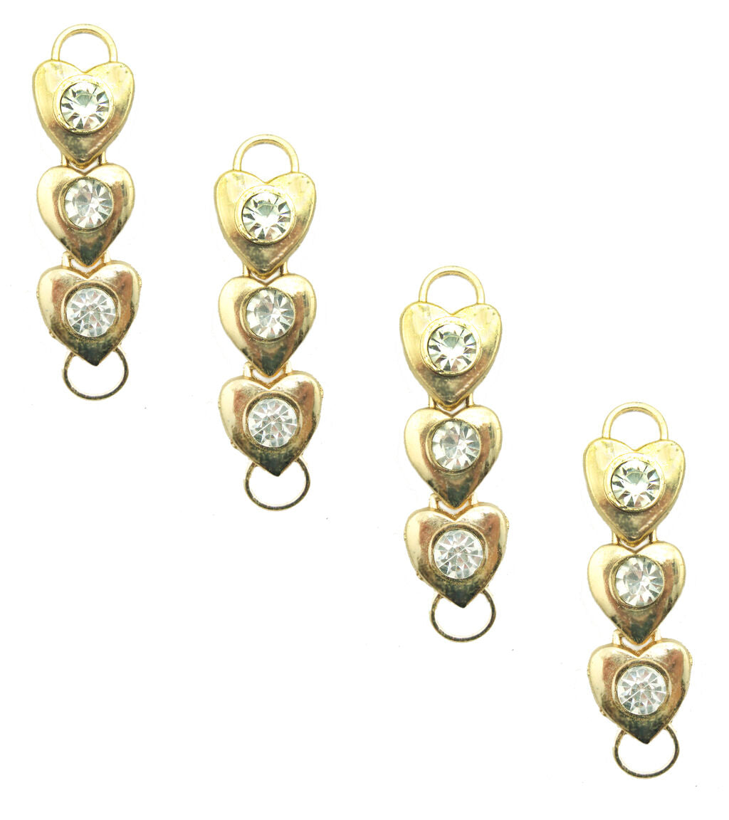 Gold tone three hearts embellishment with white crystals