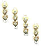 Gold tone three hearts embellishment with white crystals