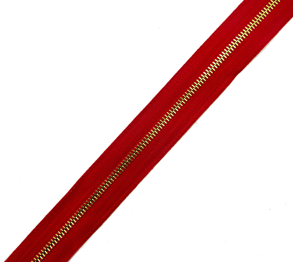 No.3 red continuous gold metal zip displayed on a white background