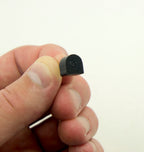 Side view of the black heel tips suitable for shoe repair.