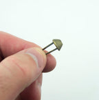 Close-up of a 10 mm dark bronze stud suitable for clothing and bags.