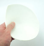 XL white bra pads laid flat to showcase size and shape.