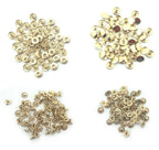 Light brass tone 4-part press stud buttons displayed on a white background.