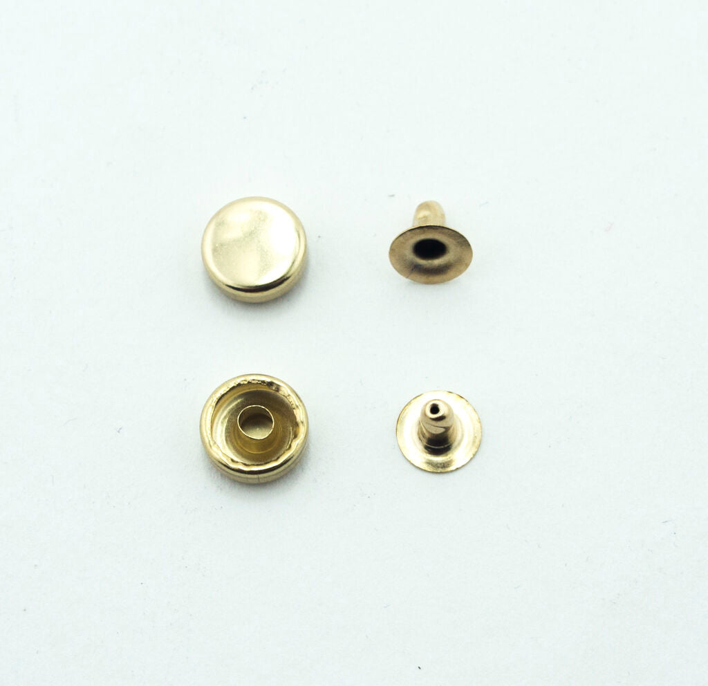 Close-up of 10mm diameter press stud components