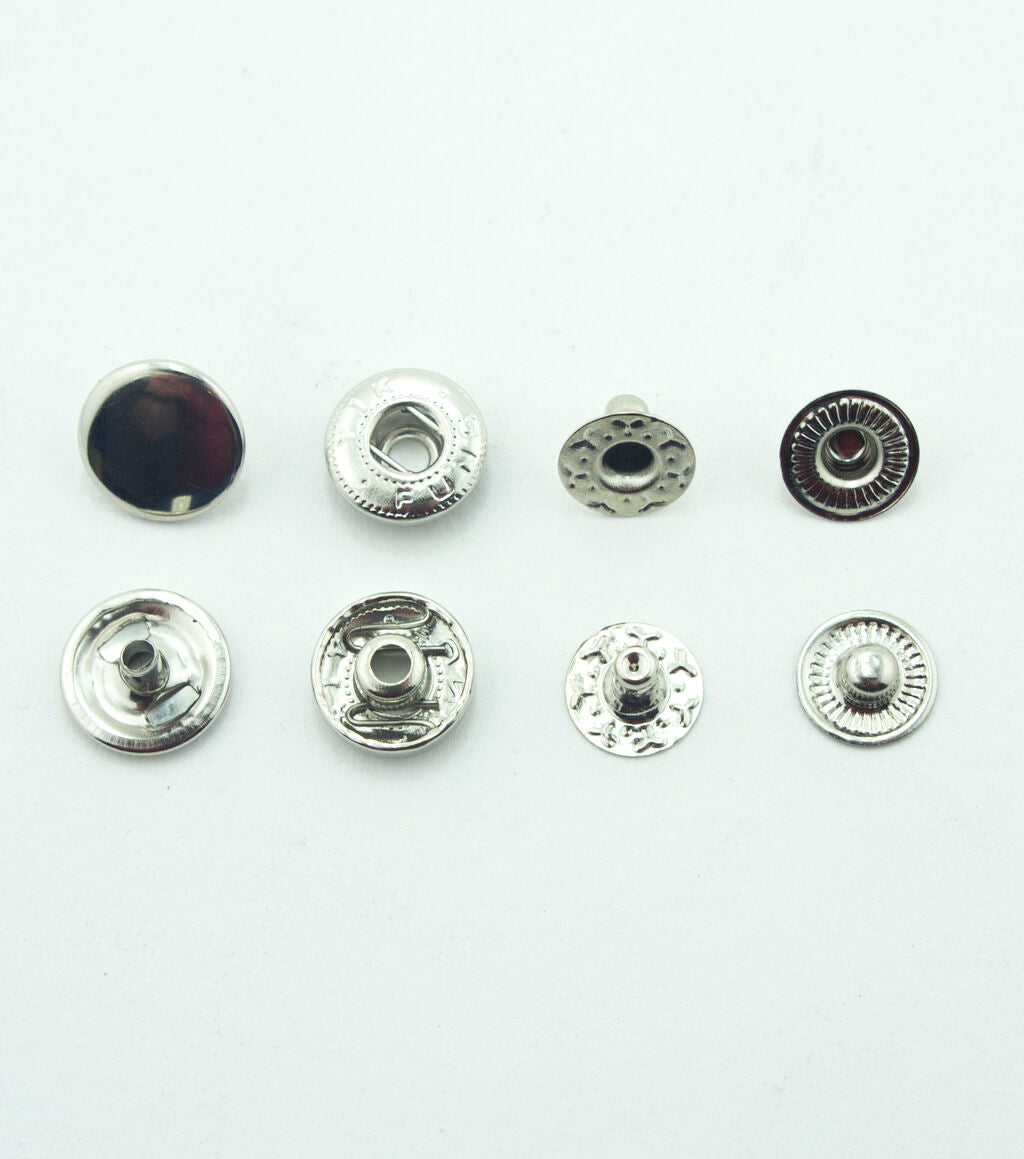 Pack of 20 silver tone press stud buttons displayed in a neat arrangement.