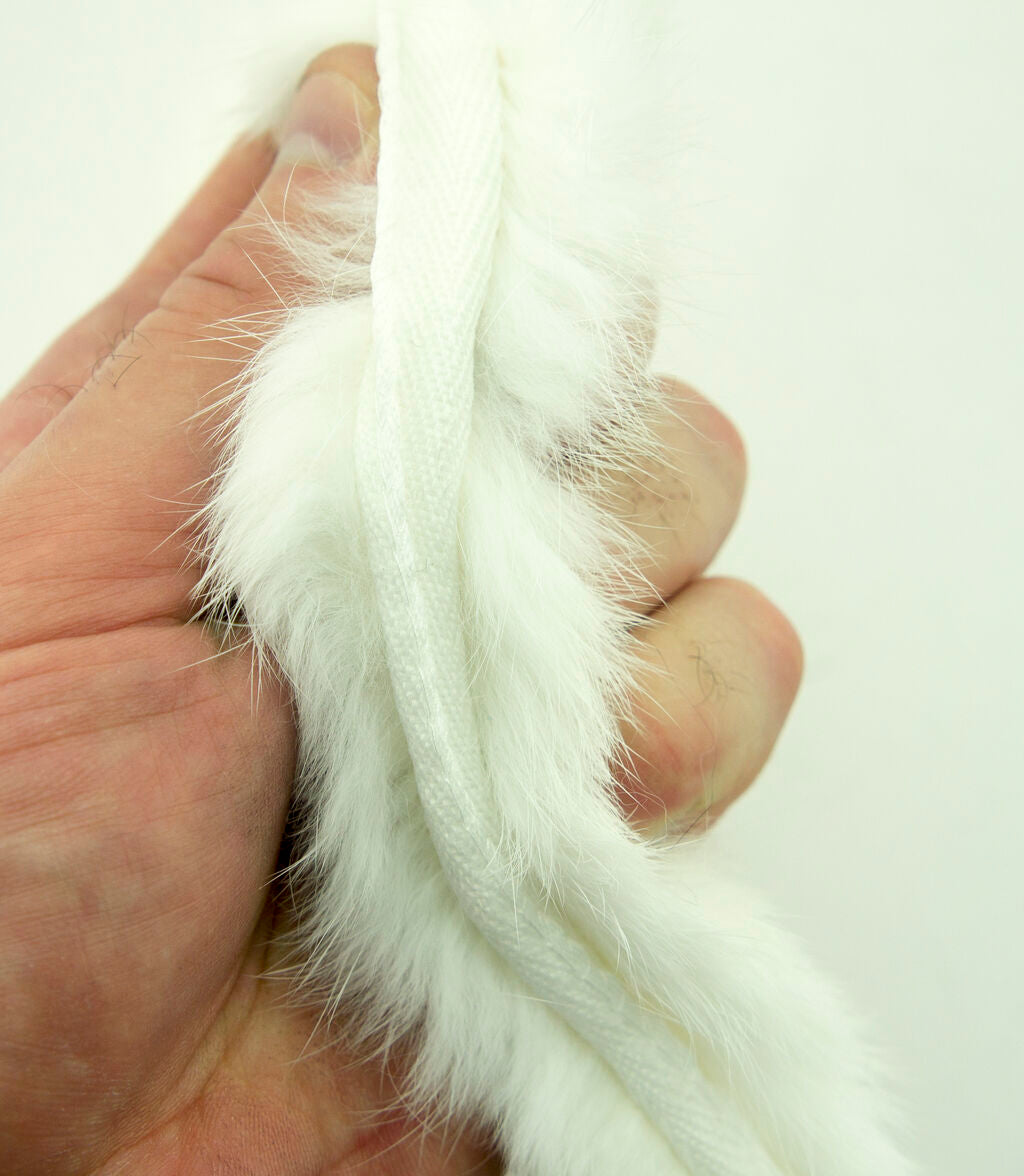 Roll of white rabbit fur piping trim ready for sewing projects