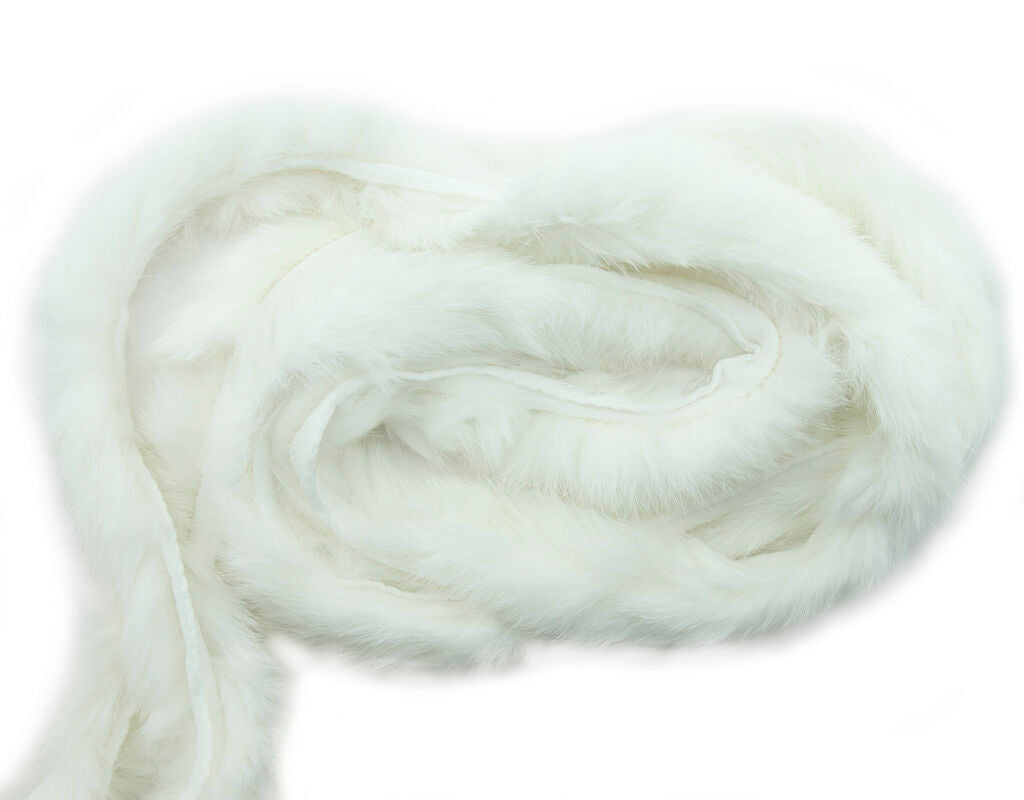 Close-up of white rabbit fur piping trim showing fluffiness