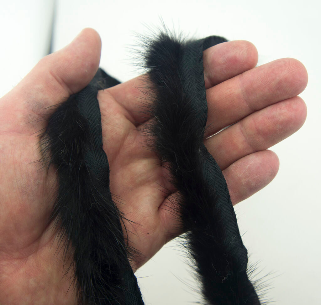 Roll of white mink fur piping trim ready for crafting
