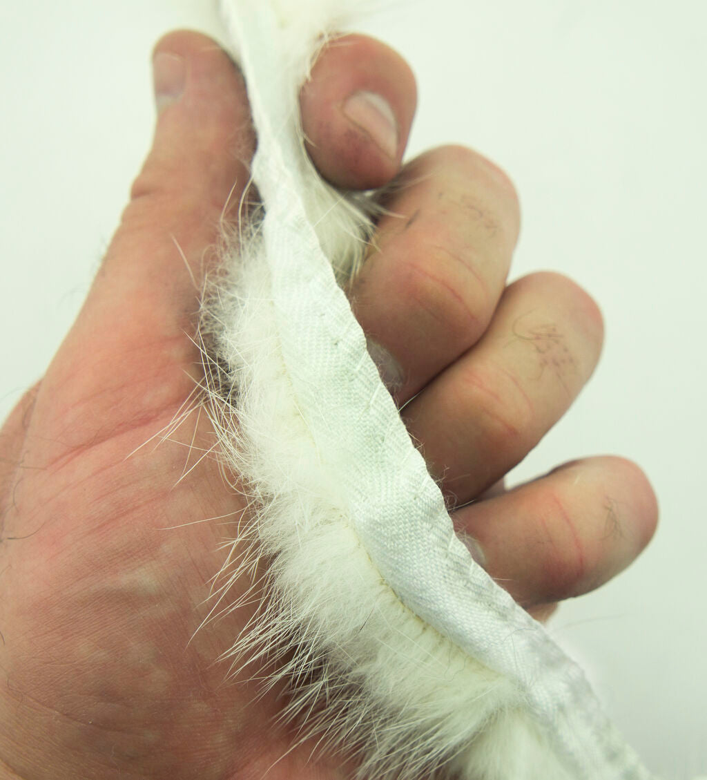 White mink fur piping trim used on a coat edge