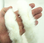 White rabbit fur trim displayed on a cushion