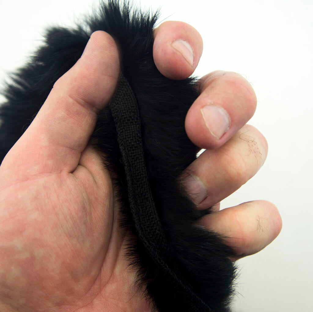Roll of white rabbit fur piping trim in packaging