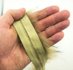 Close-up of the fluffy texture of the fox fur piping trim.