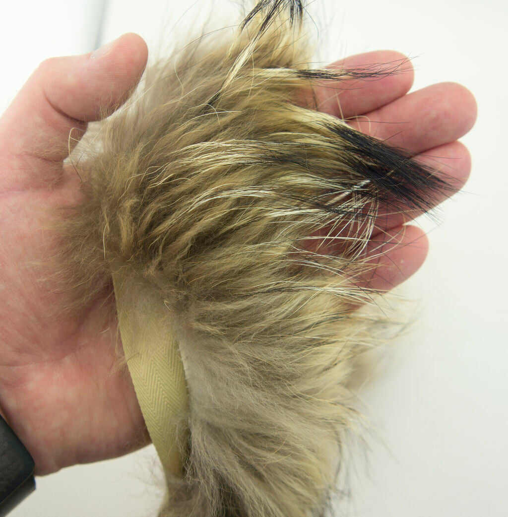 Piping trim being used on a garment for edging.