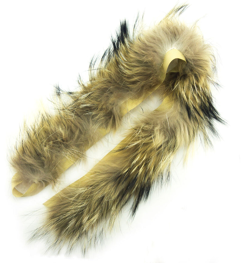 Mixed brown fox fur piping trim displayed on a flat surface.