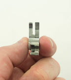 Close-up view of the step foot for sewing machines