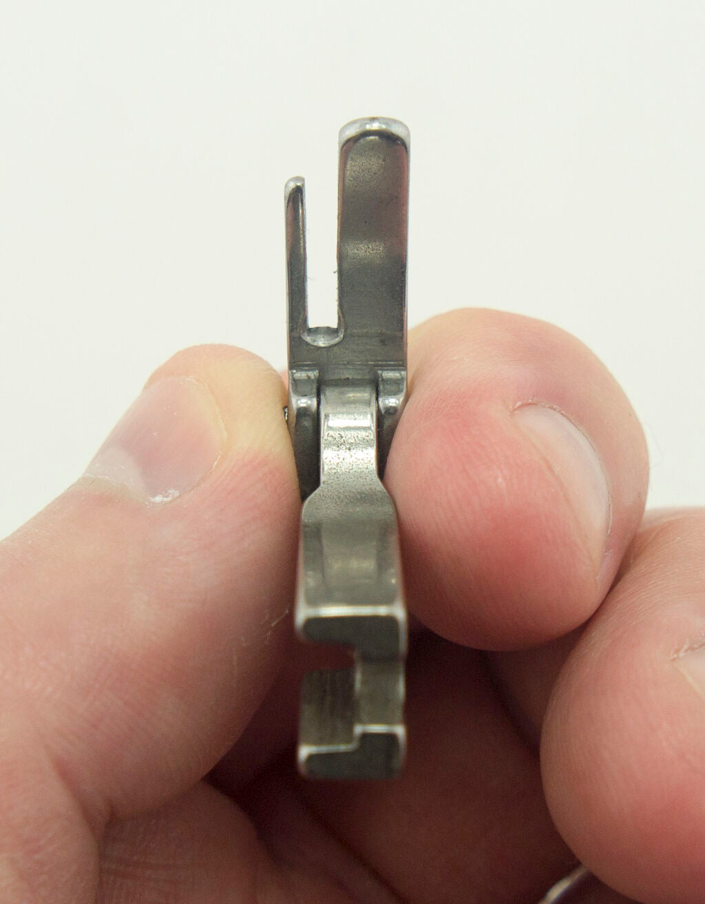 Close-up of the right foot for jacket zip sewing