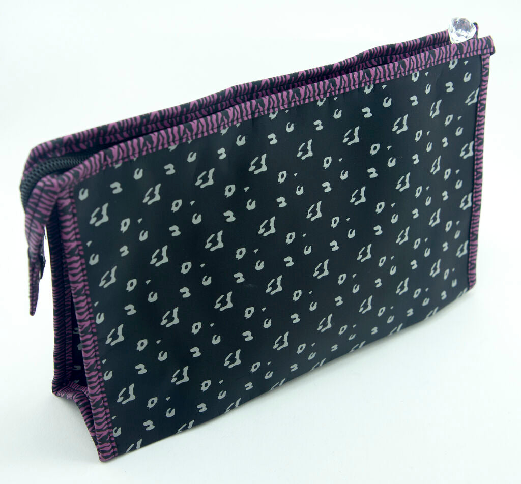 Open view of the pink make-up bag featuring a mirror attachment.