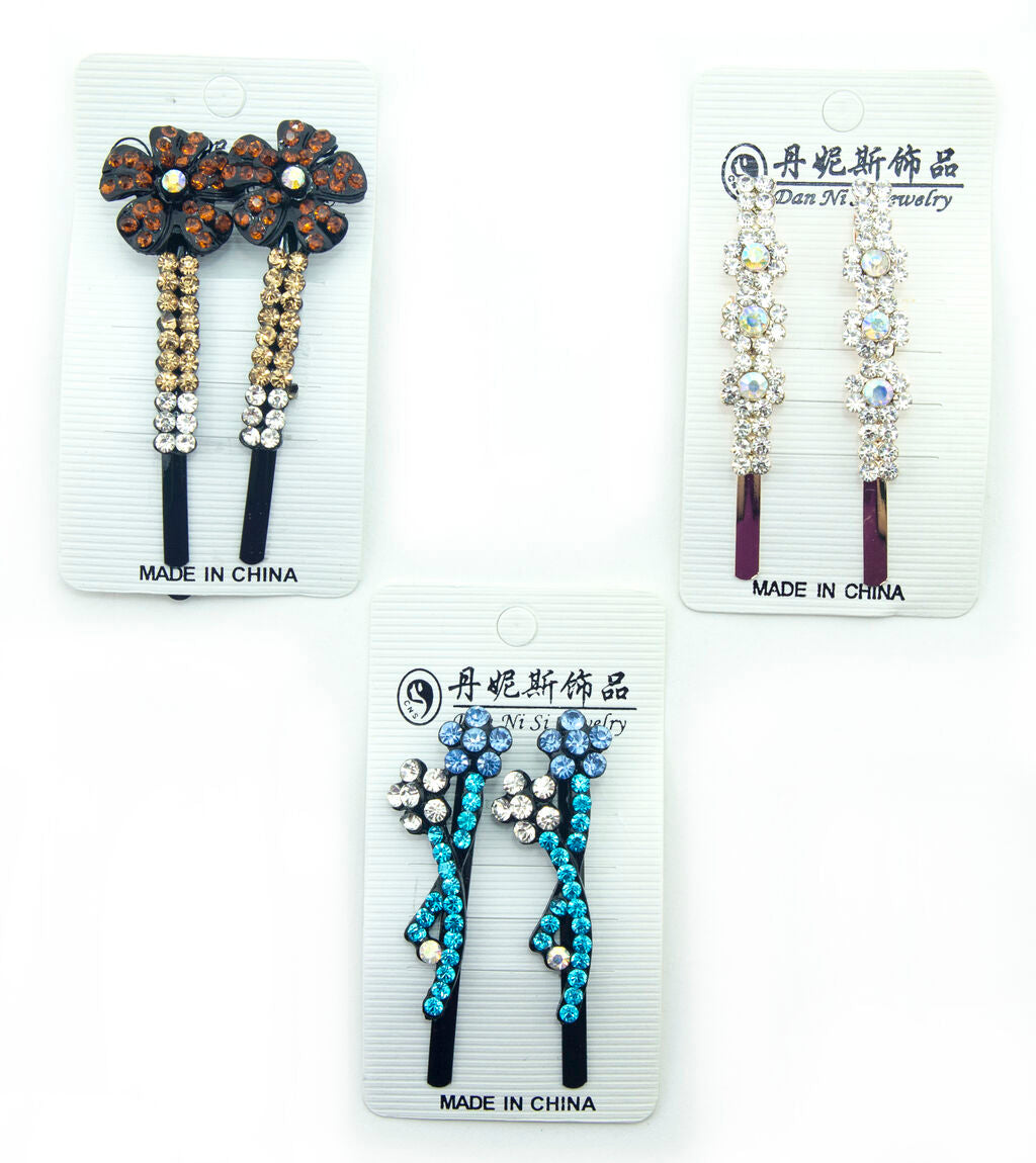 Close-up of assorted designs of crystal hairclip barrettes.