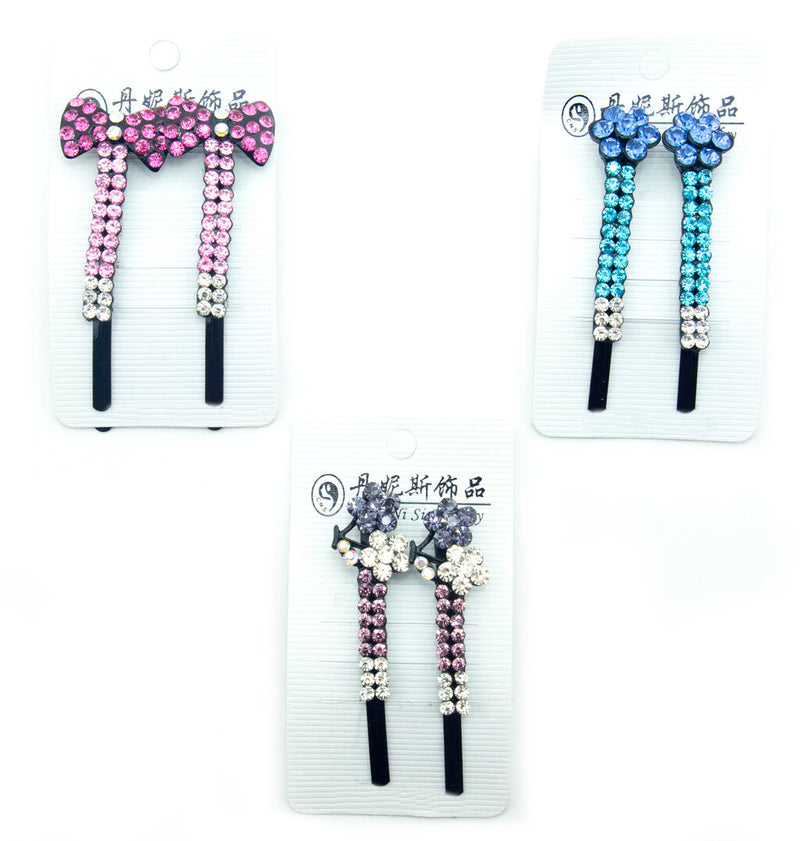 Three pairs of colourful crystal hairclip barrettes displayed together.