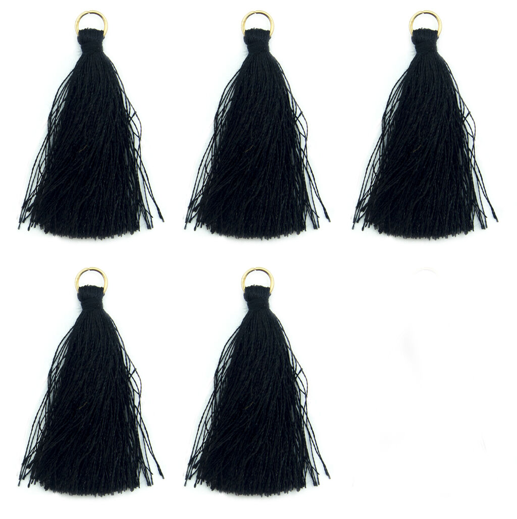 Five black silky tassels with antique brass rings displayed together.