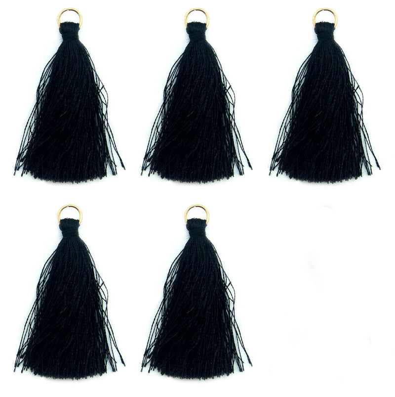 Five black silky tassels with antique brass rings displayed together.
