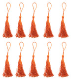 Pack of 10 dark orange silky tassels, each 12cm long.